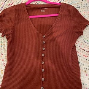 size m maroon ruffled shirt